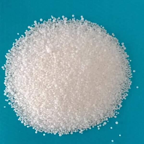 Close-up of high-nitrogen urea fertilizer granules with uniform crystalline texture