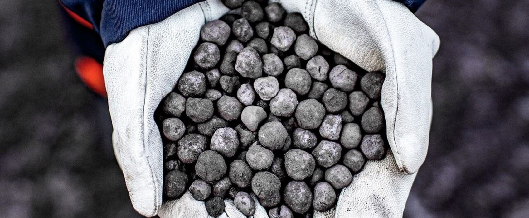 top view of a handful of iron pellets