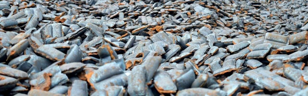 close up of a pile of hot briquetted iron