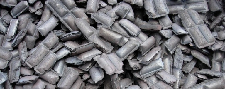 top view of a pile of hot briquetted iron