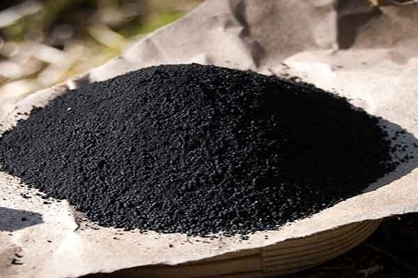 close up of black iron concentrate powder